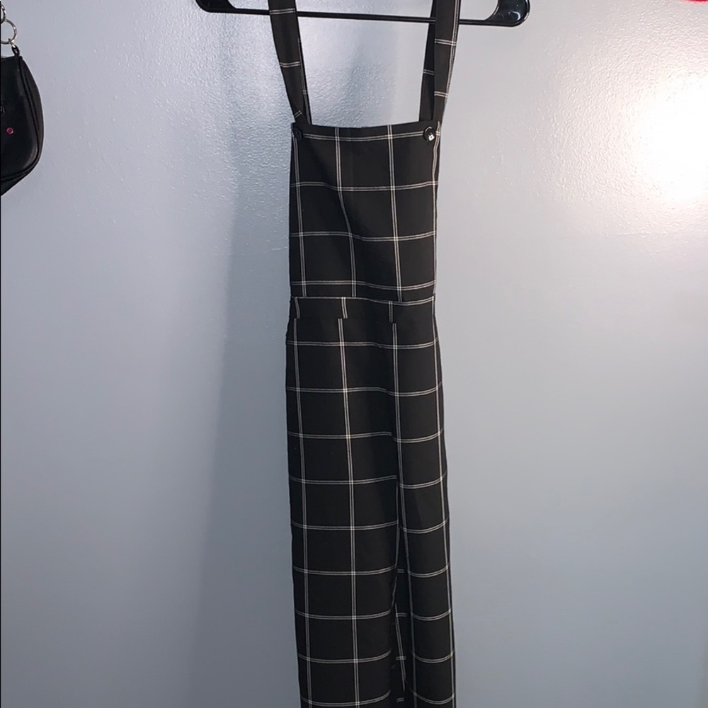 Plaid overalls.